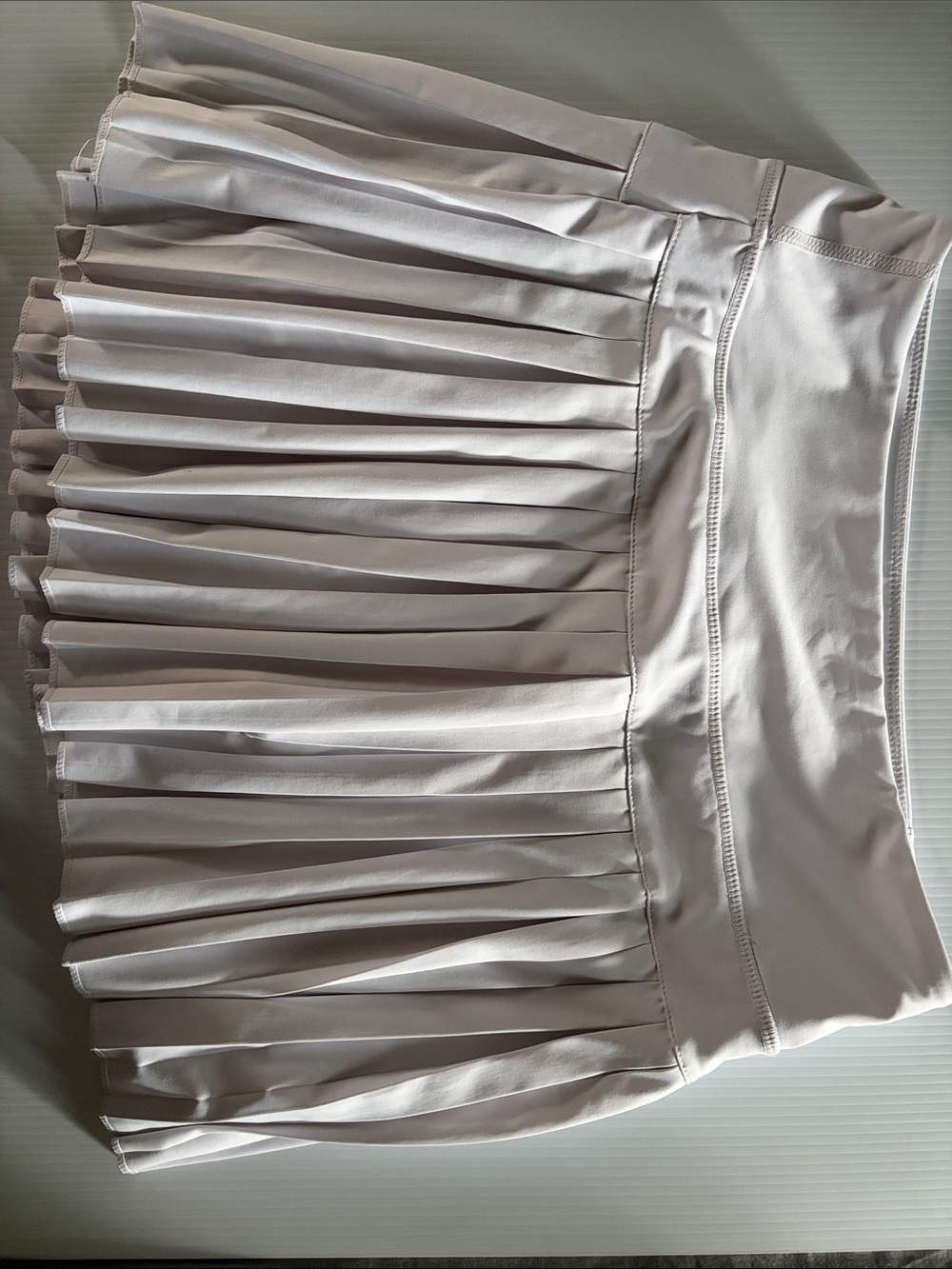Women's Pleated Mini Skirt in Light Beige